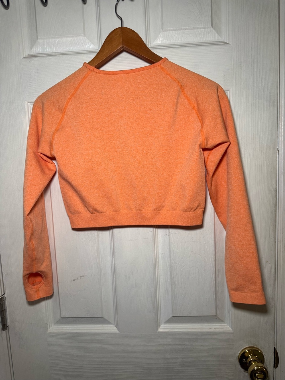 2 cropped, seamless shirts.Coral Orange and yellow. Large